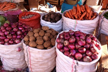 Ethiopian market street vendor with variety of food products February 2019, Bahir Dar, Ethiopia
