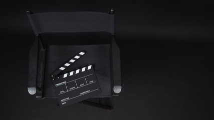Clapperboard or clap board or movie slate with director chair use in video production ,film, cinema...