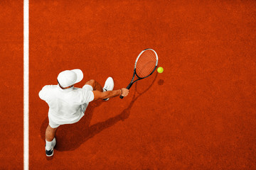 Man playing tennis - obrazy, fototapety, plakaty