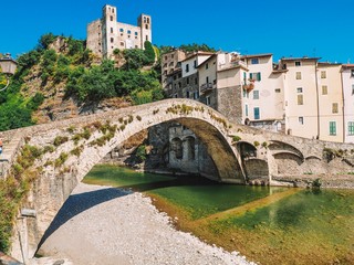 Fototapeta na wymiar Venetian-style bridge in Dolceaqua, Italy, Bridge and the fortress