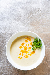 Vegetable soup on stone table