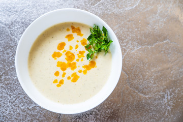 Vegetable soup on stone table