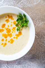 Vegetable soup on stone table