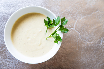 Vegetable soup on stone table