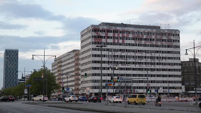 STOP WARS sign on abandoned building of the former Haus der Statistik. Street art near Alexanderplatz in Berlin, Germany. Building facade with graffiti slogan 