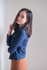 Asian girl, shot body length, is wearing summer outfit with a cute emotion