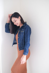 Asian girl, shot body length, is wearing summer outfit with a cute emotion