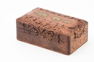 Vintage wooden jewelry box on a white background