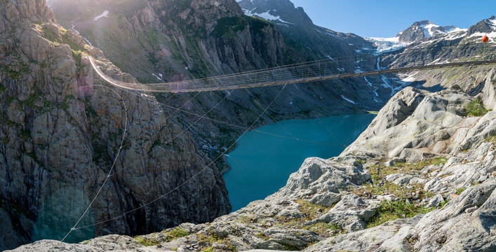 panoramic view of lake Triftsee with Trift Bridge