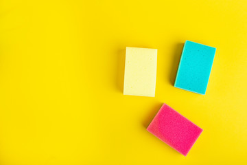 colorful sponges on bright background