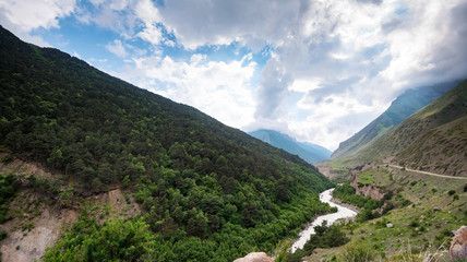 Panoramic view of beautiful mountains and river in northern caucasus in summer