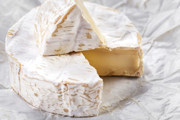 cut brie cheese close up