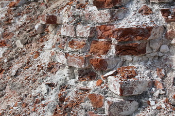 destroyed by time the brick walls of the ancient temple