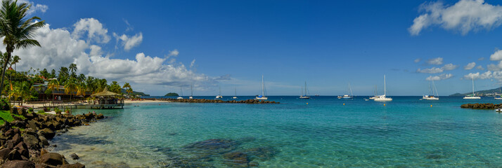 view of the beach with blue sky and clouds n Martinique Island