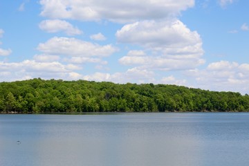 A beautiful view of the peaceful lake on a sunny day.