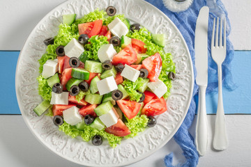Fresh Greek salad with tomatoes, lettuce and feta cheese