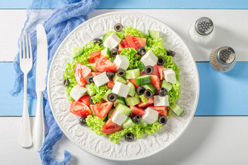 Delicious Greek salad with tomatoes, lettuce and feta cheese