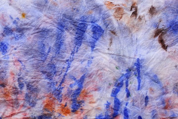 the texture of the cloth stained with gouache