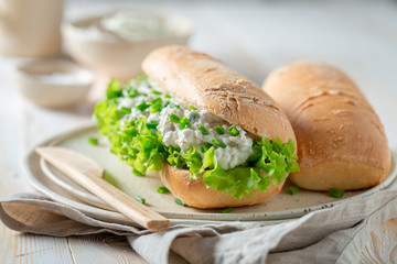 Healthy sandwich with crunchy bread, chive and fromage cheese