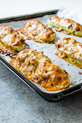 Baked Zucchini Courgettes Stuffed with Cheese and Dill.