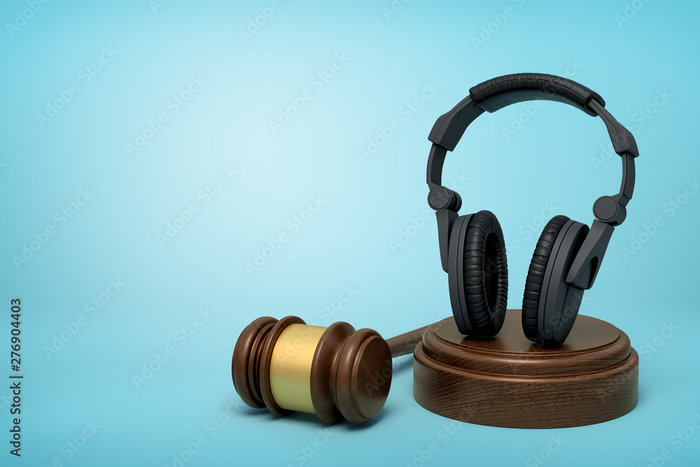 Poster 3d rendering of black headphones standing upright on sounding block with judge gavel beside on light
