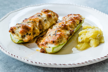 Baked Zucchini Courgettes Stuffed with Cheese and Dill.