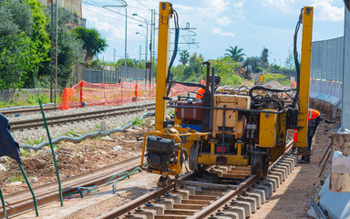 Rail excavator on reconstruction of the railway rails