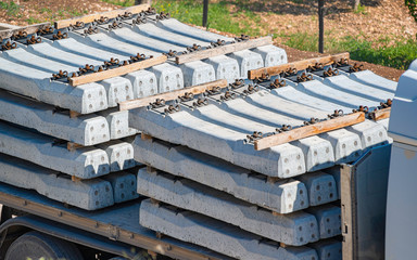 Pile of precast concrete sleepers ready for construction in trackwork