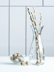 quail eggs with a sprig of willow