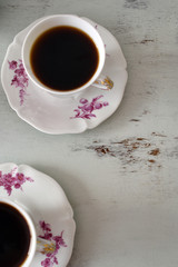 Coffee in vintage porcelain cups
