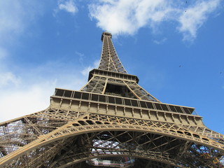 View of the Eiffel Tower in the morning with blue sky in the background