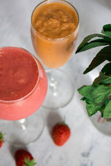 smoothies in a glass on a white background