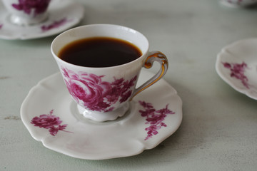 Coffee in vintage porcelain cups