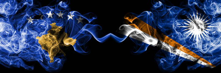 Kosovo vs Marshall Islands smoky mystic flags placed side by side. Thick colored silky smokes...