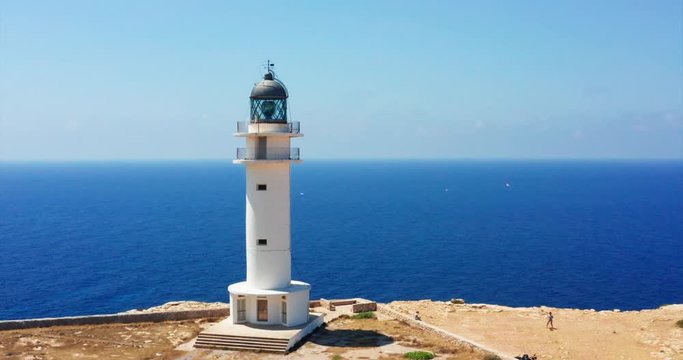 Aerial shot of  the Lighthouse near Pilar de la Mola in Formentera Island in Spain during summer holidays time.