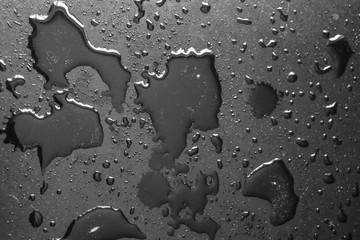 texture background water drops on a black background
