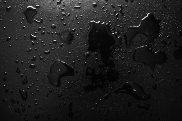 texture background water drops on a black background