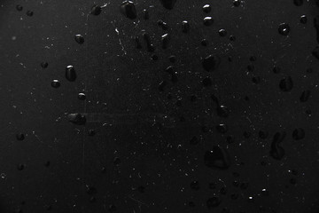 texture background water drops on a black background