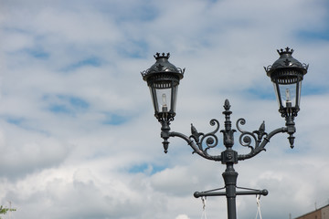Fototapeta na wymiar lamp on the street. pillars with lighting. street lamp