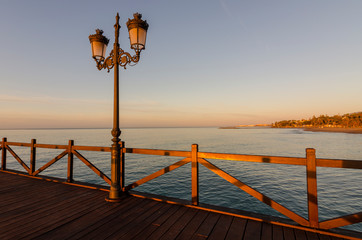 Early hours of daylight on the beach of Marbella on the Costa de Sol (Malaga) Spain