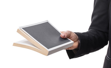 female hand holding book
