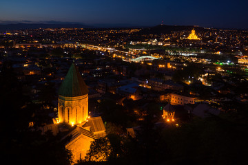 nighttime in tblisi city panorama with monuments