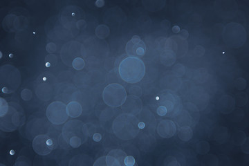 abstract sparkle bokeh light effect with navy blue background
