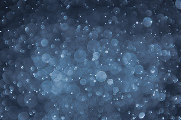 abstract sparkle bokeh light effect with navy blue background
