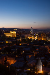 Fototapeta na wymiar nighttime in tblisi city panorama far view