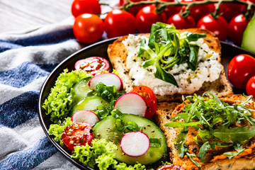Breakfast - sandwiches with vegetable salad
