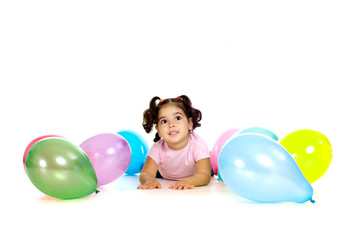 Young girl with balloons on white background