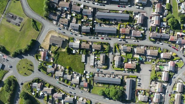 Vertical aerial view looking down on small streets and buildings on a small, residential area of a town (Ebbw Vale, Wales)