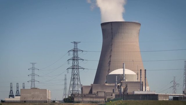 Doel Nuclear Power Plant with smoking cooling towers
