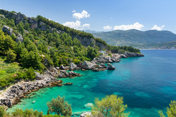 beautiful coast with turquoise of Ionian sea in Himare in Albania - obrazy, fototapety, plakaty